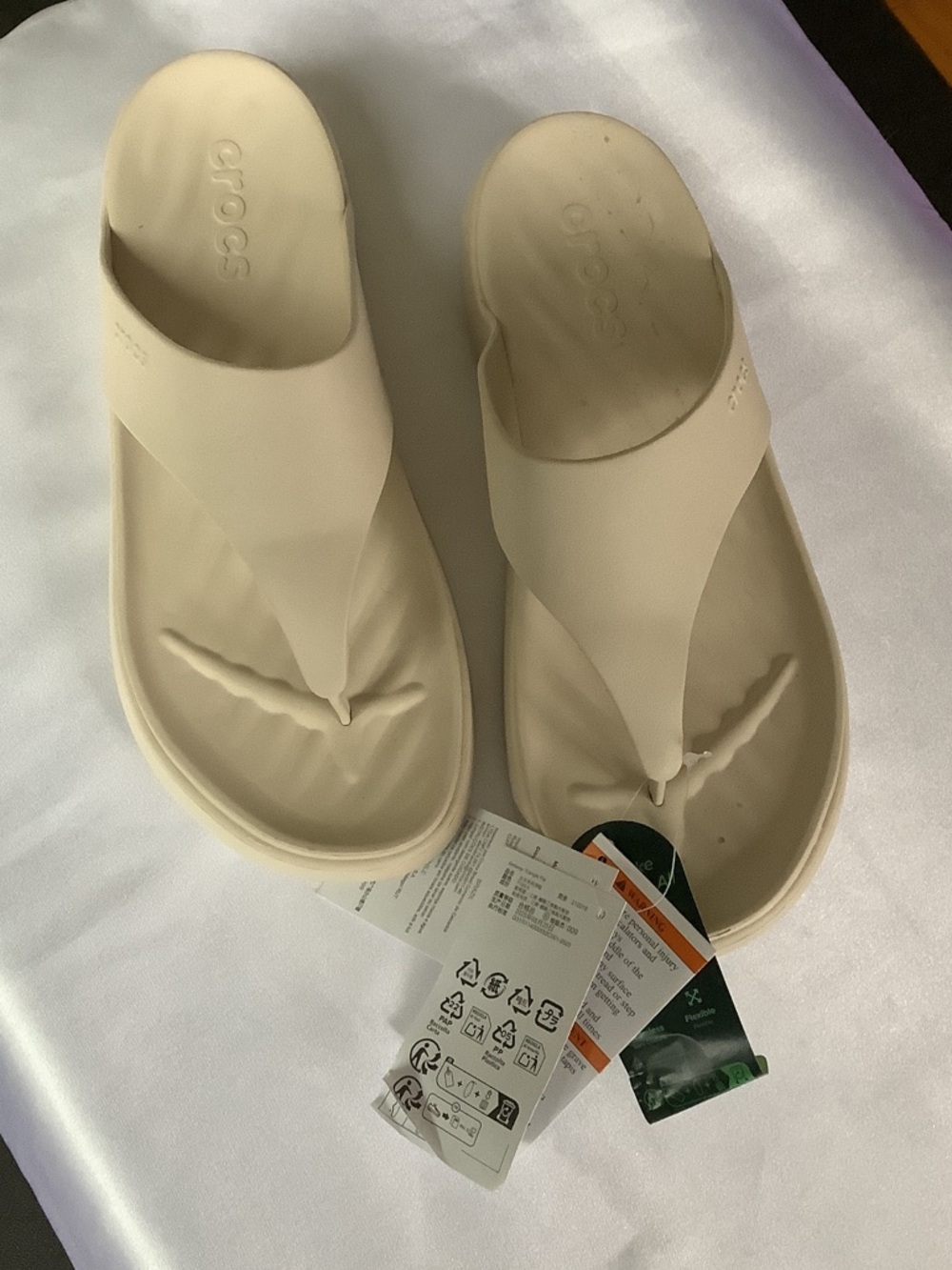 CROCS Women’s Classic Thong Sandal in Neutral Cream. NEW